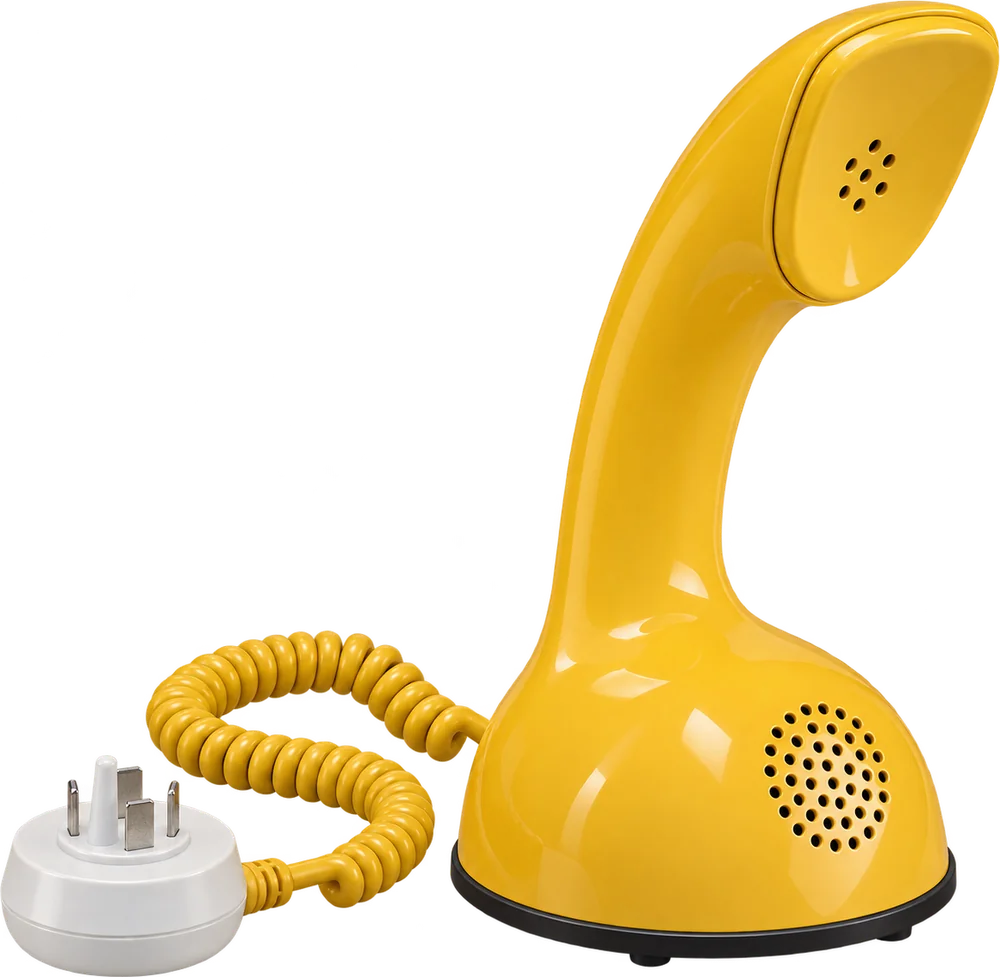 A yellow Ericofon telephone with its cord unplugged
